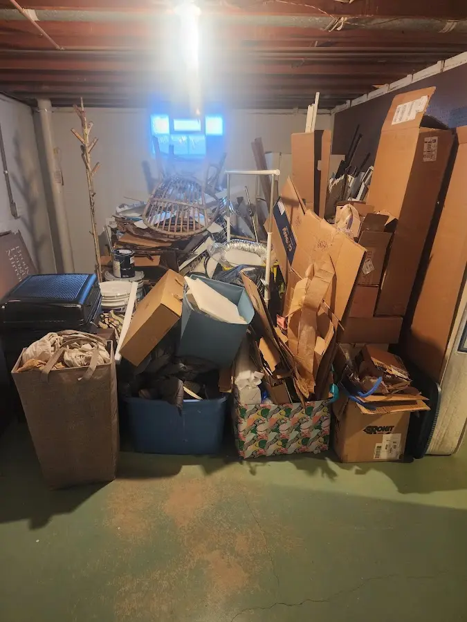 Roll-off dumpster container at job site for 15 Yard Dumpster Rental in Franconia